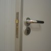 Lever handle with sash lock